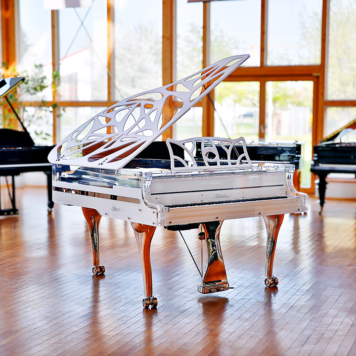 White Blüthner Crystal Hive Elegance Grand Piano with a titanium coloured iron frame